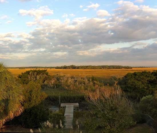 Crabbing dock on tidal creek with kayaks